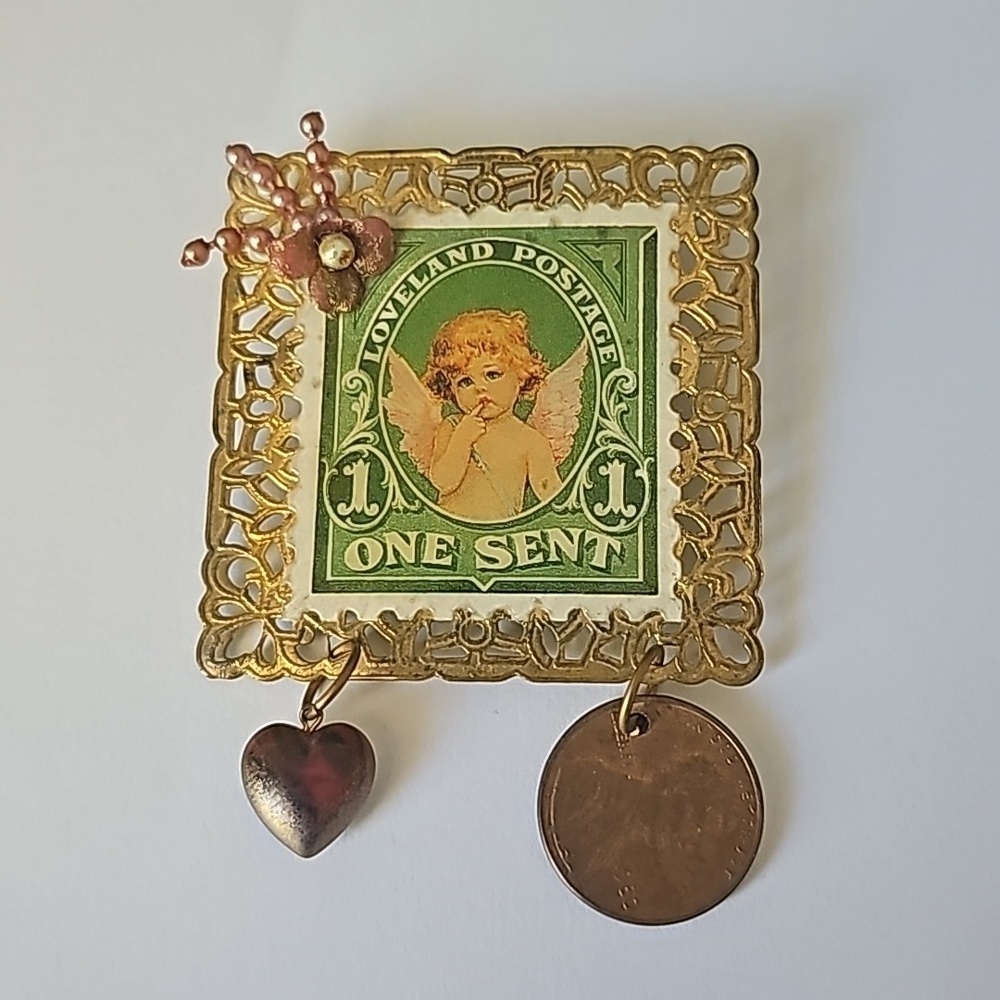 True vintage Loveland Postage Stamp brooch with 1 Cent and heart pendants
